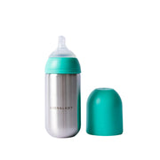 Bottle with turquoise cap and base on a white background