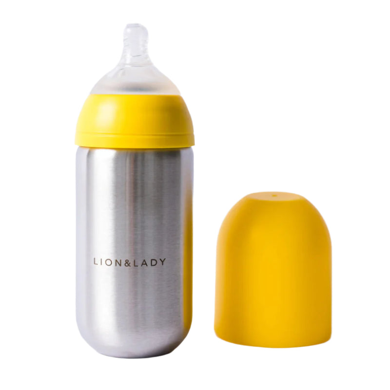 Silver bottle with yellow cap and base on a white background, featuring the brand 'LION&LADY'.