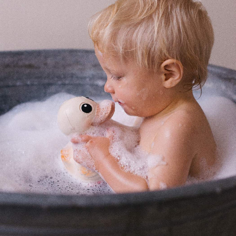 HEVEA® Kawan Rubber Duck - Mini, a Scandinavian-designed, 100% natural rubber bath toy. Plant-based, vegan-certified, and hand-painted with natural, FDA-approved pigments. Designed without holes to prevent mold, making it safe and hygienic. Soft yet textured for teething, perfect for bath time, the beach, or playroom adventures. Eco-friendly and biodegradable, ensuring a greener planet.